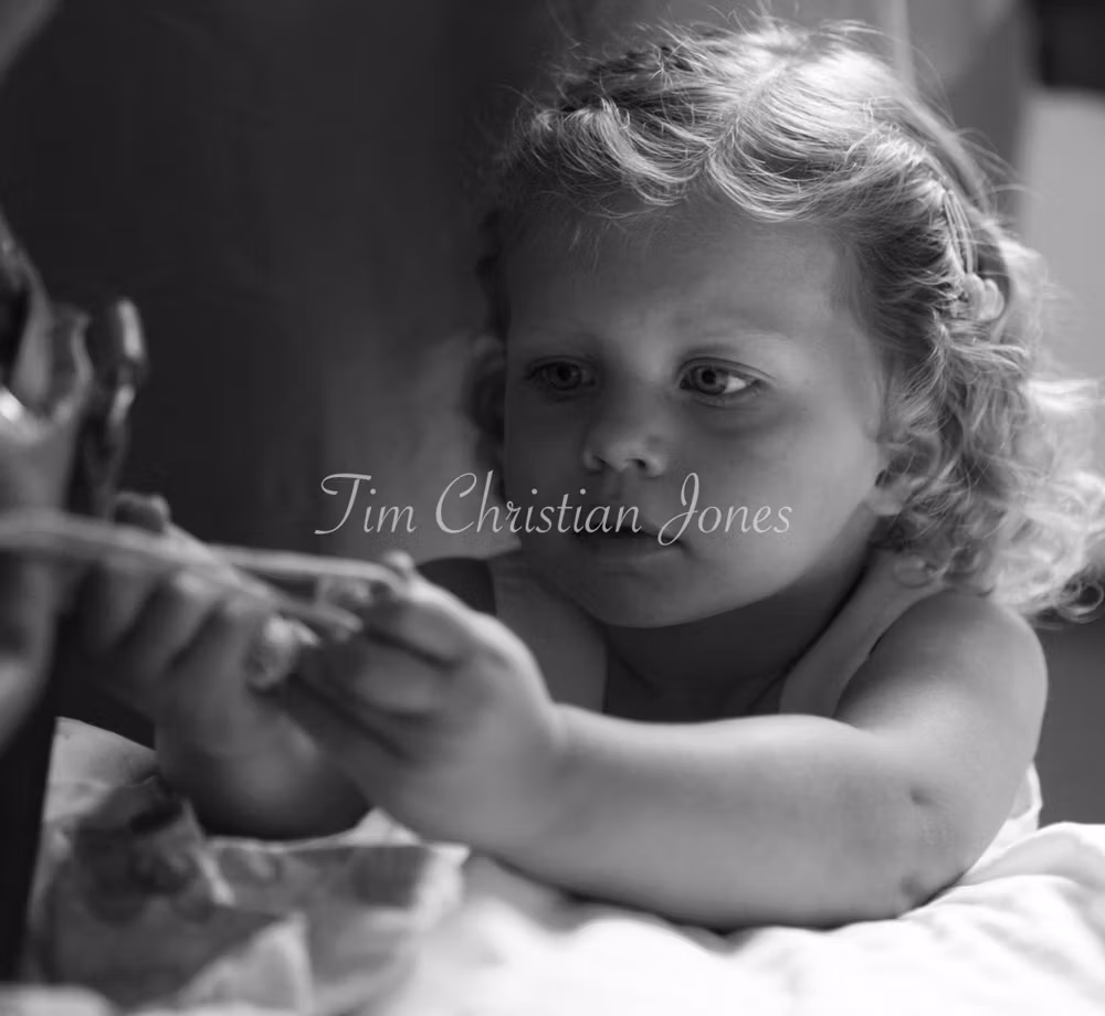 The bride's daughter in Black and White captured during the morning of the wedding