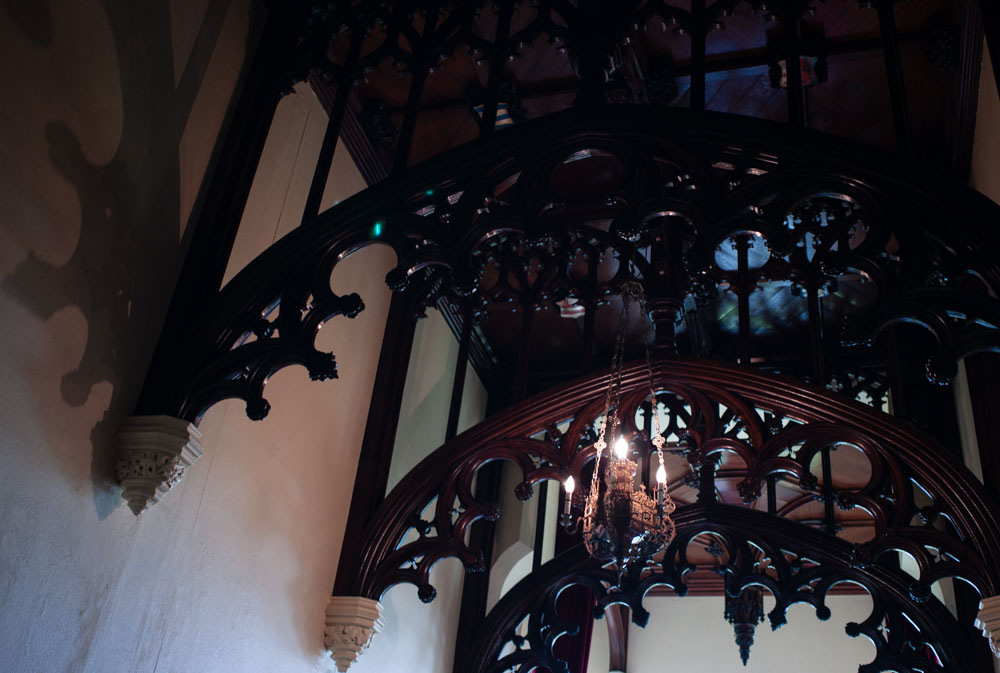 Dramatic wood-framed ceiling of Allerton Castle interior, captured naturally by Leeds wedding photographer Tim Christian Jones