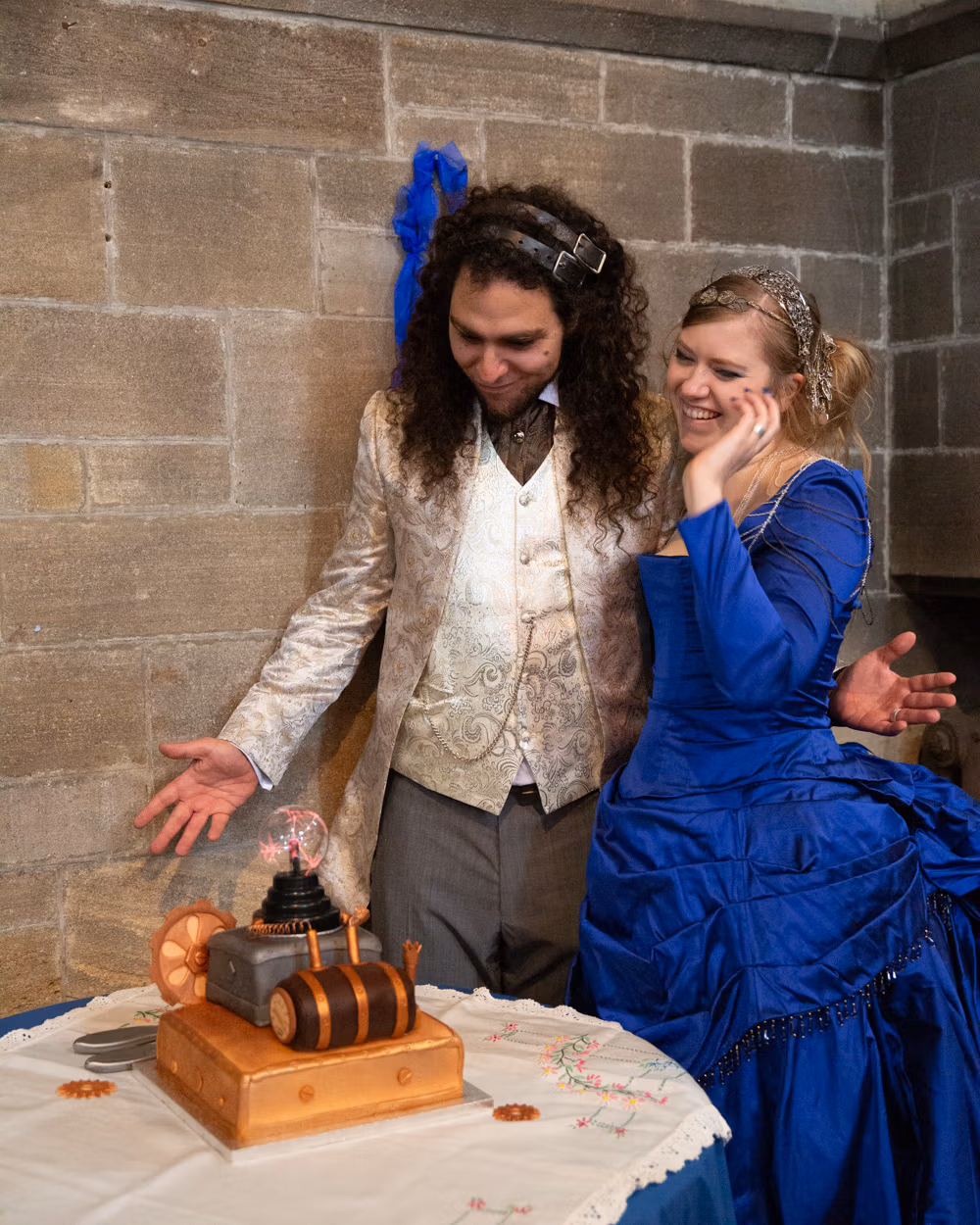 Linsey and Chris cutting the cake at Left Bank, Leeds
