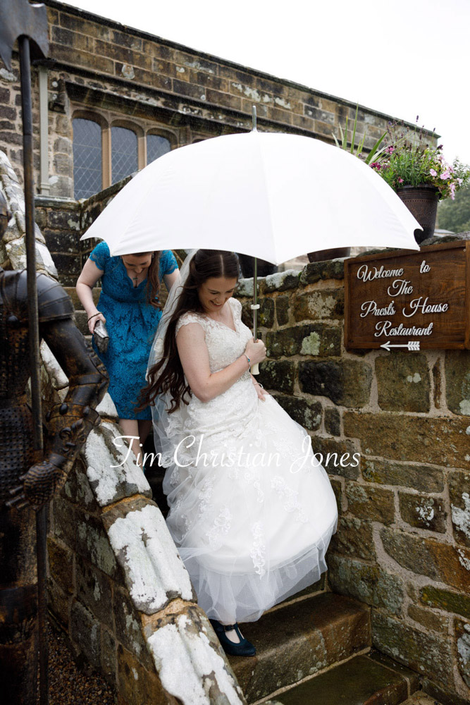 Yorkshire Wedding Romance at The Priest’s House – Jane & Callum 7 007 bride walking holding white umbrella jc