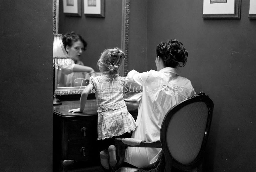 Candid Leeds wedding photographer - Bride and daughter make up during preparation