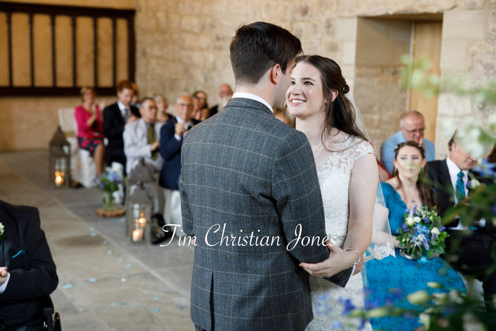 Yorkshire Wedding Romance at The Priest’s House – Jane & Callum 18 018 couple smile at each other during wedding ceremony jc