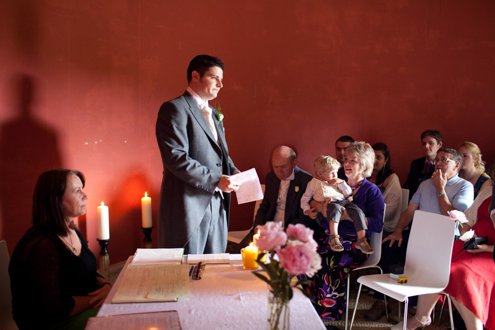 A reading during the ceremony by the best man - Captured by a Destination Leeds, West Yorkshire wedding photographer