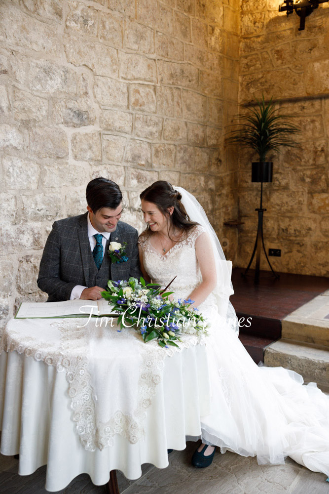 Yorkshire Wedding Romance at The Priest’s House – Jane & Callum 21 021 couple smiling by wedding register table jc