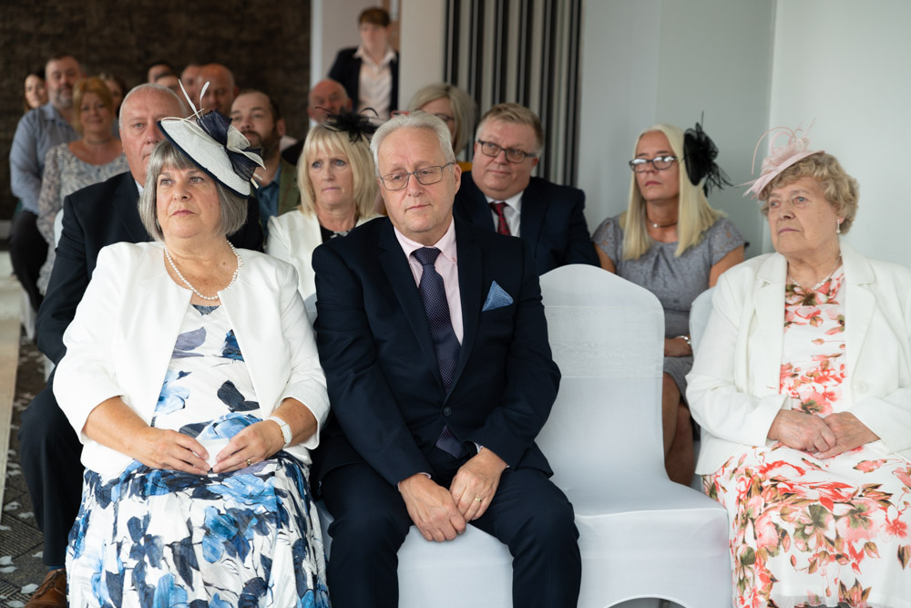 Clare’s family watching the ring exchange with pride
