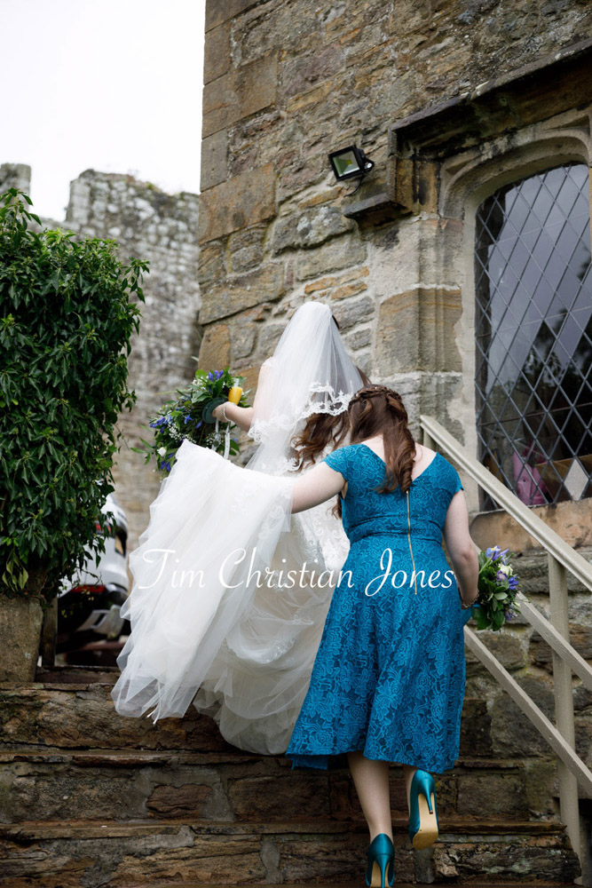 Yorkshire Wedding Romance at The Priest’s House – Jane & Callum 33 033 bridesmaid helping bride dress train jc