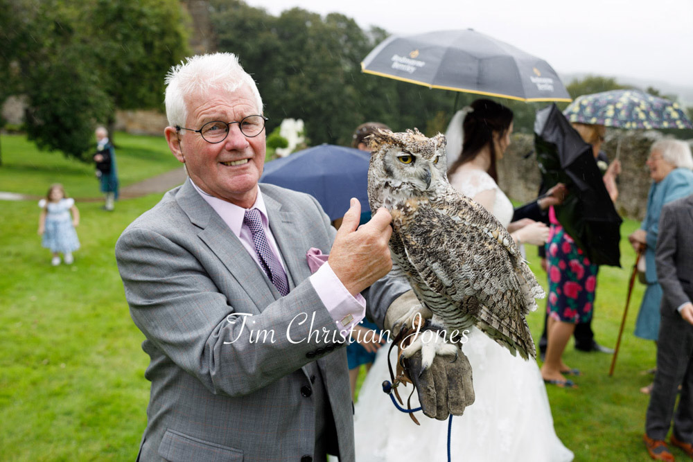 Yorkshire Wedding Romance at The Priest’s House – Jane & Callum 44 044 grooms father holding owl barden tower jc
