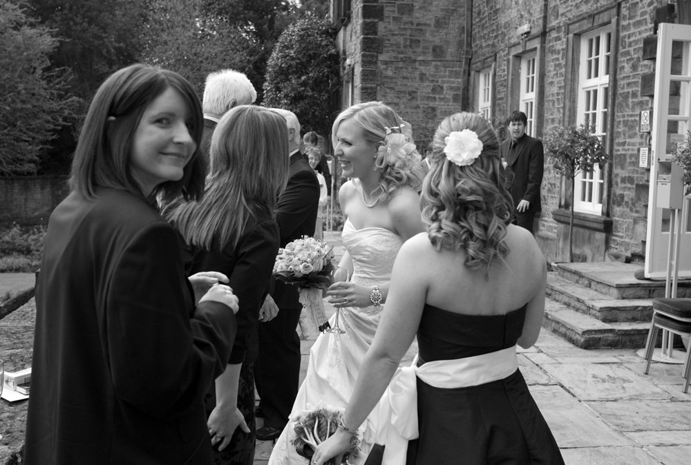 One guest turns to camera as everyone steps outside
