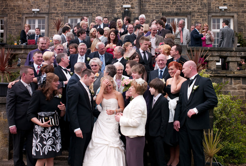 Guests chatting naturally for a relaxed group photo