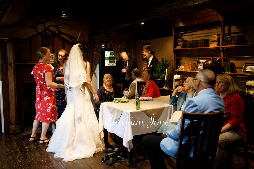 Yorkshire Wedding Romance at The Priest’s House – Jane & Callum 48 048 bride guests relax inside rainy wedding jc