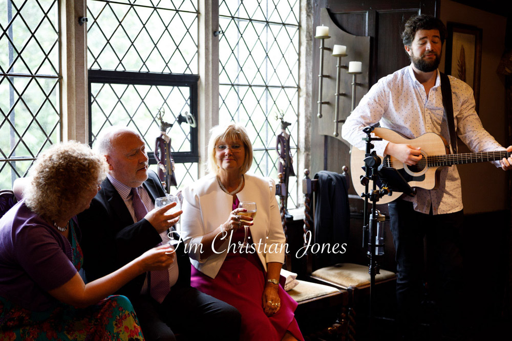 Yorkshire Wedding Romance at The Priest’s House – Jane & Callum 49 049 guitarist performing for wedding guests jc
