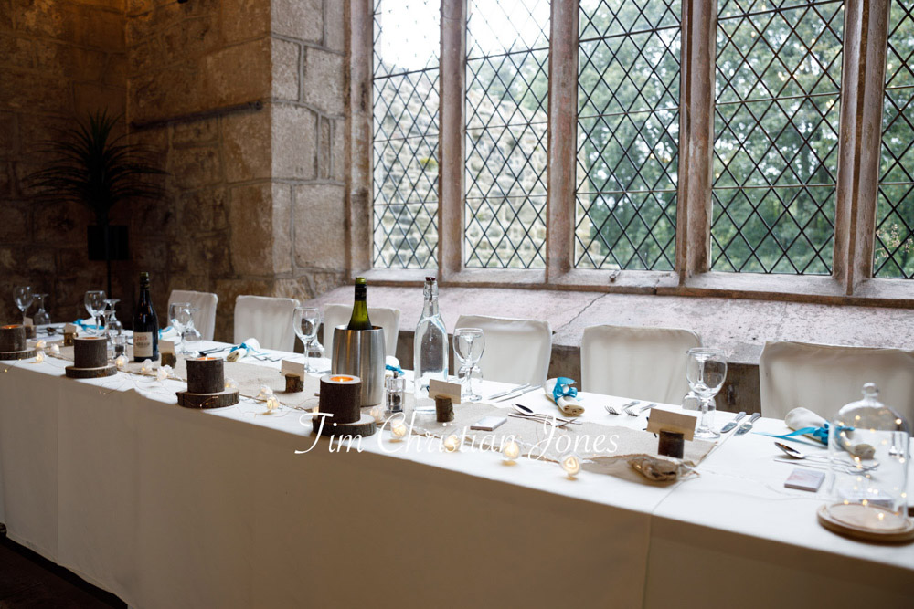 Yorkshire Wedding Romance at The Priest’s House – Jane & Callum 53 053 top table wooden candles blue ribbon napkins jc