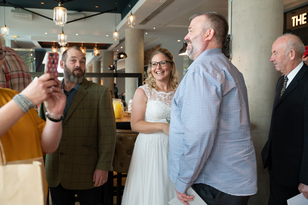 A guest taking photos on their phone