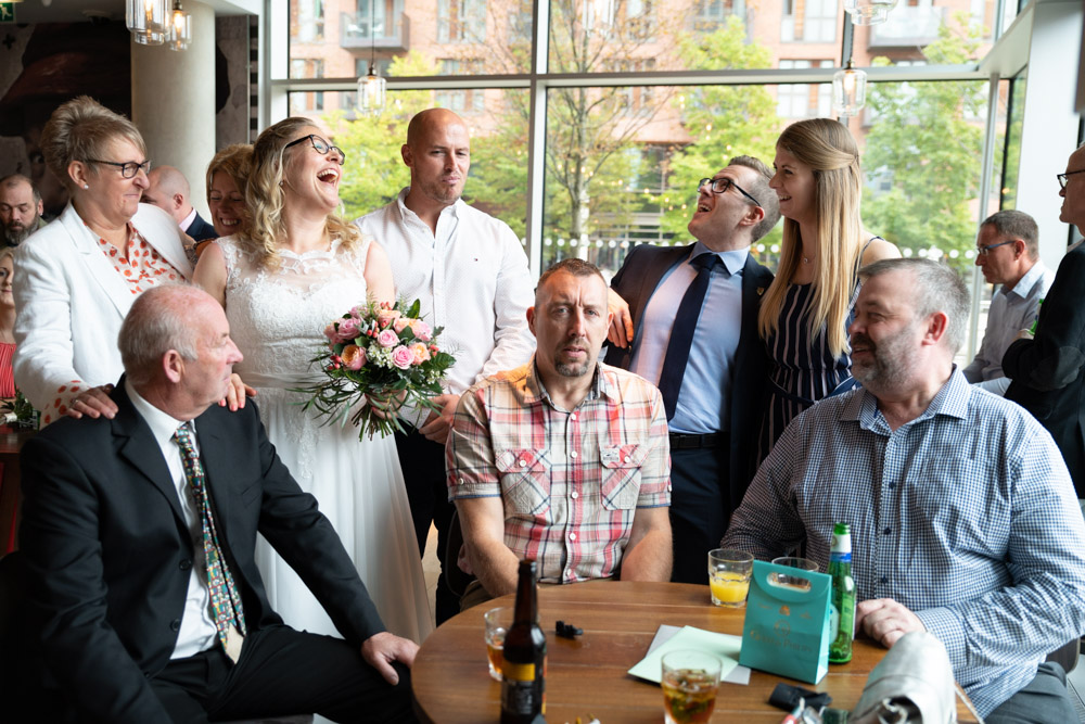 Group shot with guests smiling and one guest pretending to be serious