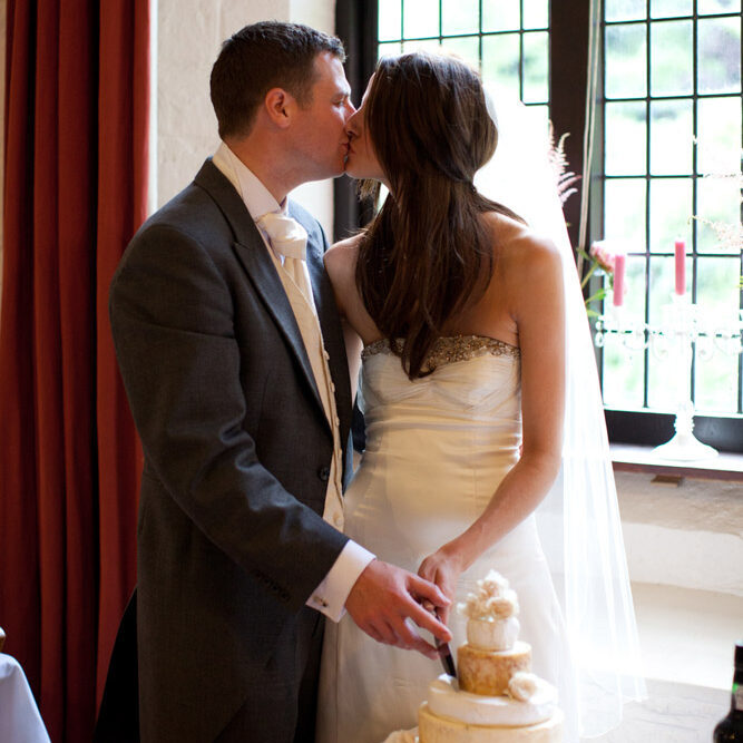 Lowri & Tim's Destination Gallery Link - by Leeds Wedding Photographer - Cutting the cake