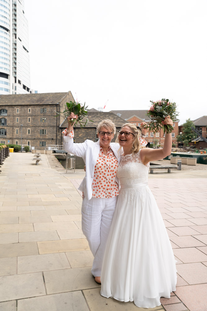 Bouquets raised high in the air
