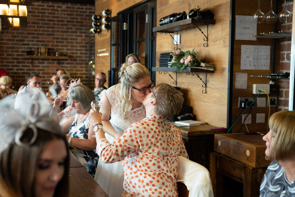 The couple share a kiss after Clare’s wedding speech
