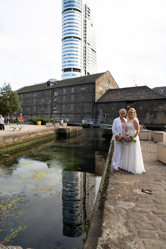 The couple stand by the Leeds canal