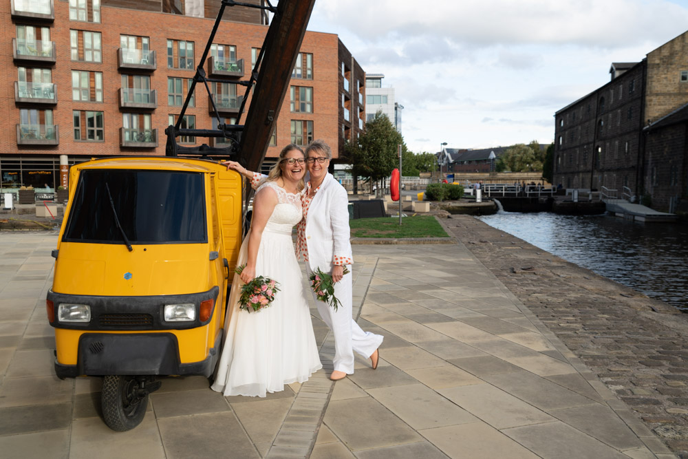 Tracey leans in for a final photo by the yellow van