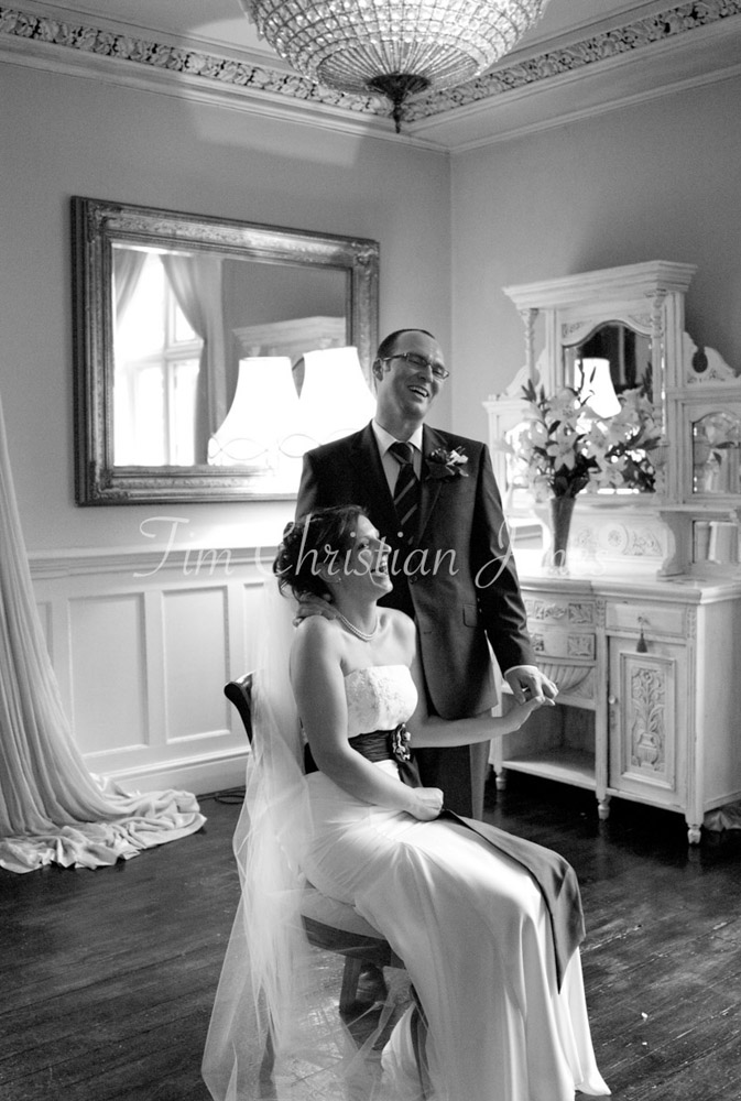 The couple smiling happily