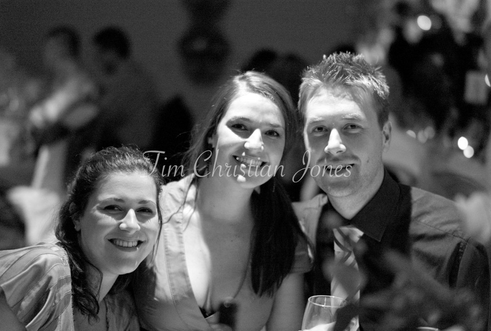 Wedding guests posed and smiling