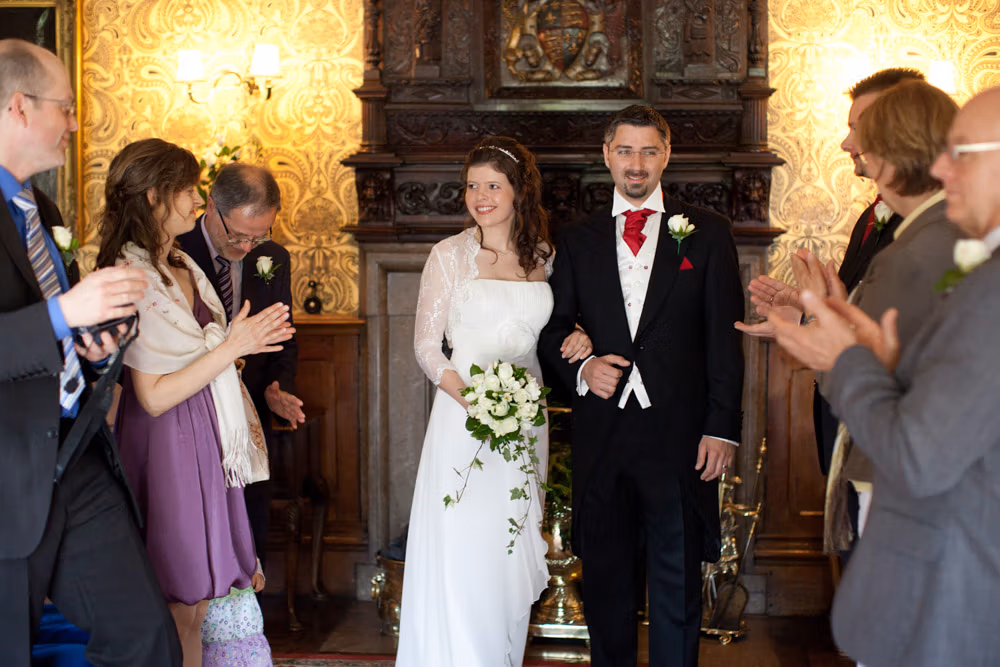 Bride and groom exiting the ceremony to the sound of applause