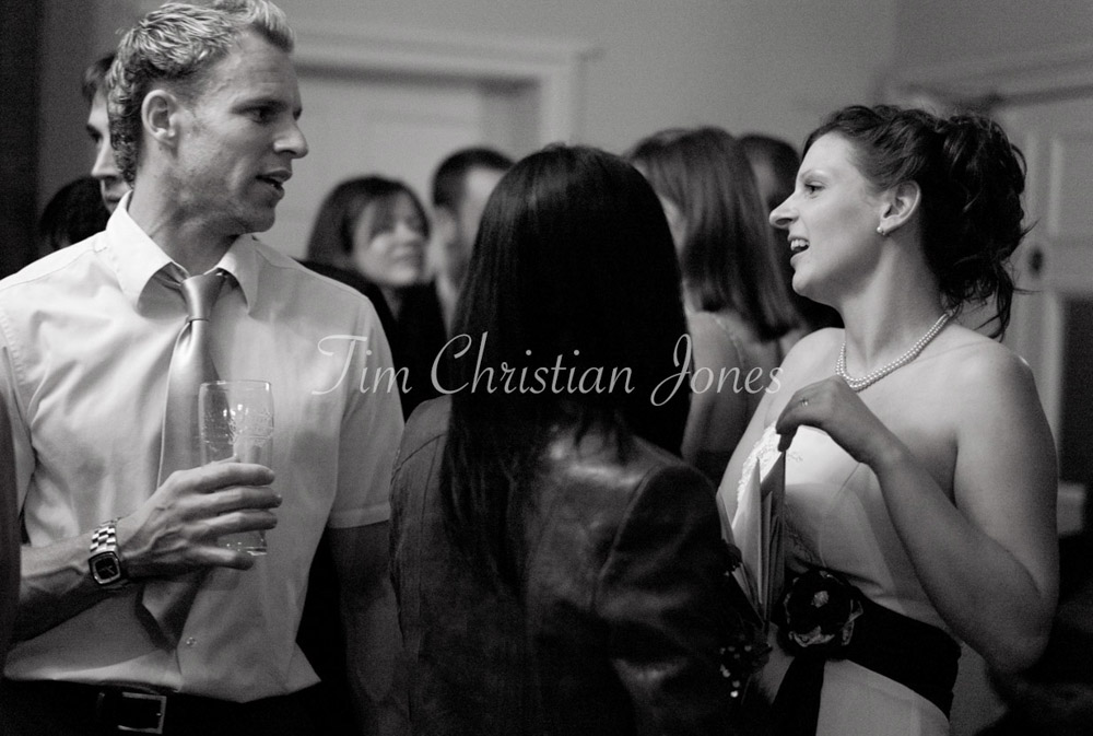 Bride mixing with evening guests