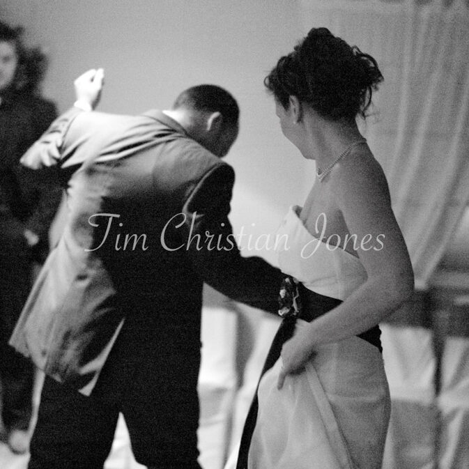 Julie and Pat share an energetic first dance, full of joy and movement at Woodborough Hall