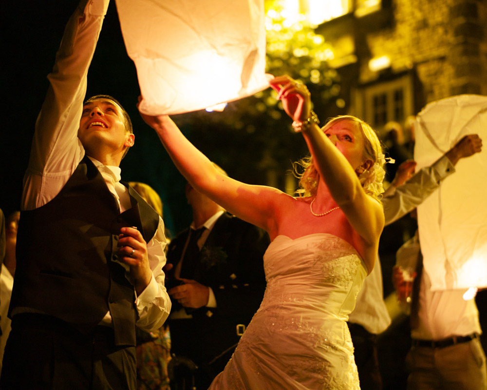 Leeds Wedding Photographer | Candid, Warm & Wonderfully Real 11 Bride and groom Chinese lanterns evening reception.